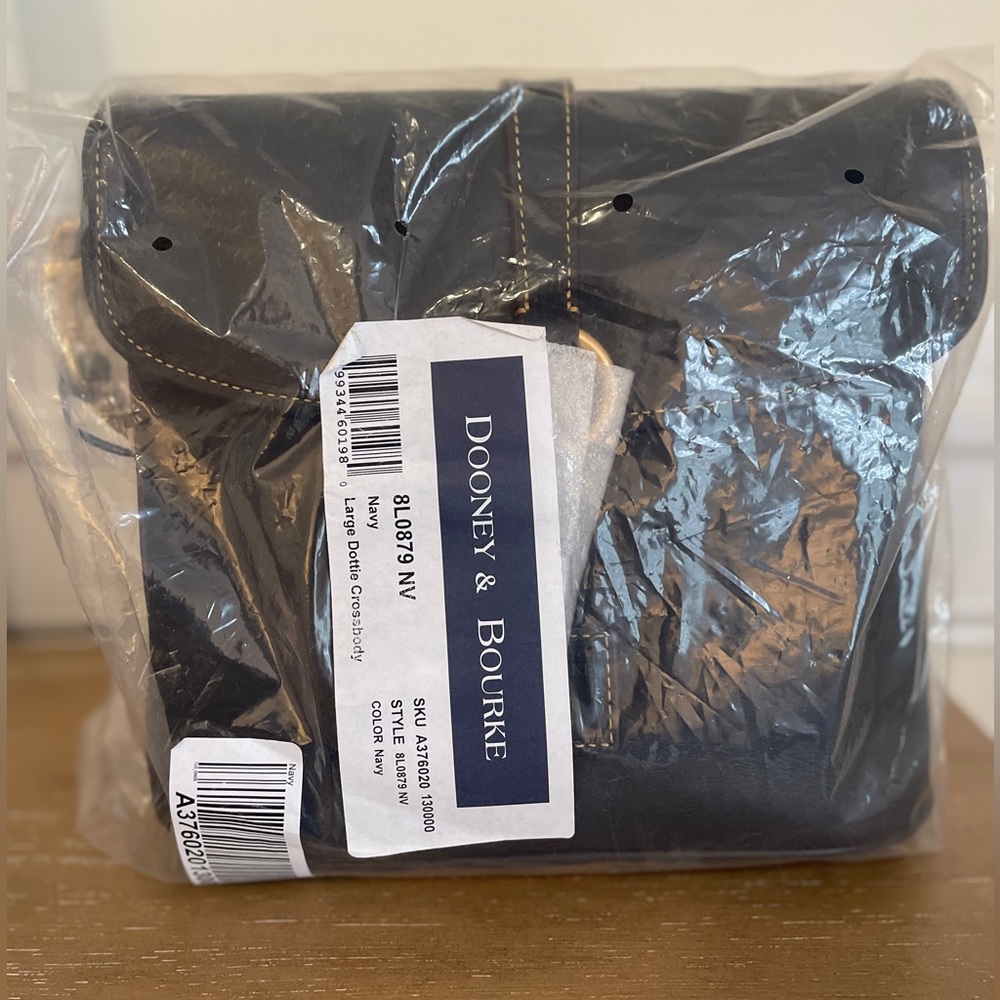 New. Never used. Florentine Large Dottie Crossbody. Navy leather